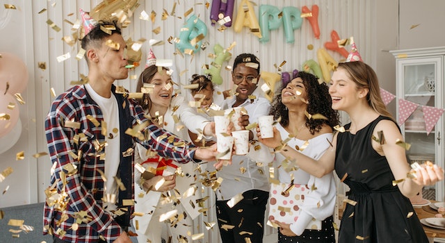 What Is The Significance Of Decoration In Creating a Magical Setting For An Encanto Celebration?